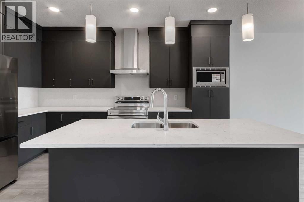 905 Livingston View Ne, Calgary, Alberta  T3P 2K6 - Photo 9 - A2237063