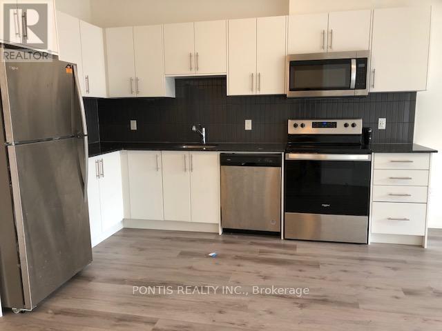 104 - 103 Roger Street, Waterloo, Ontario  N2J 0G2 - Photo 2 - X12486824