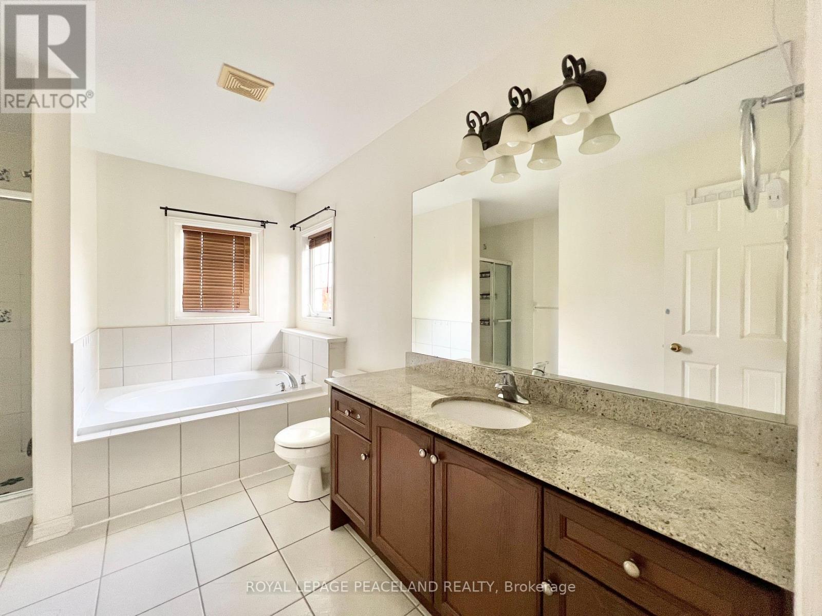 73 Castleglen Boulevard, Markham, Ontario  L6C 0A9 - Photo 25 - N12486877