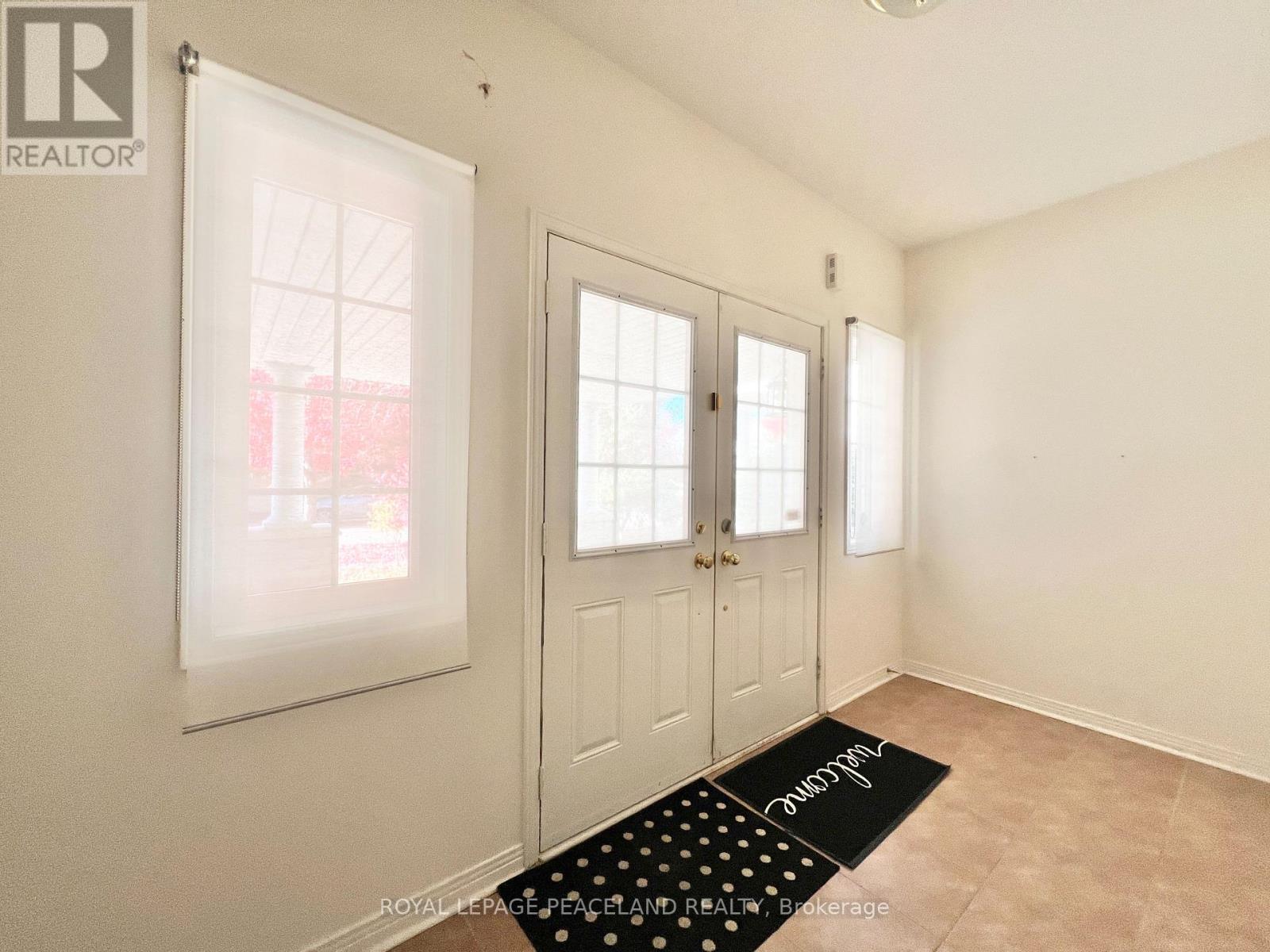 73 Castleglen Boulevard, Markham, Ontario  L6C 0A9 - Photo 5 - N12486877