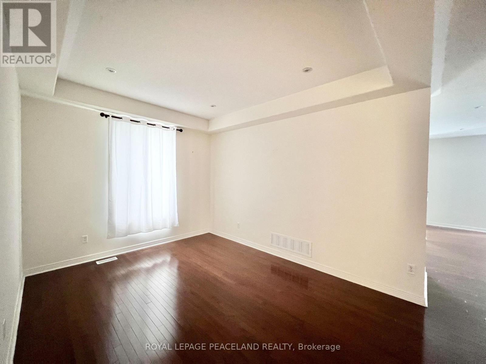 73 Castleglen Boulevard, Markham, Ontario  L6C 0A9 - Photo 7 - N12486877