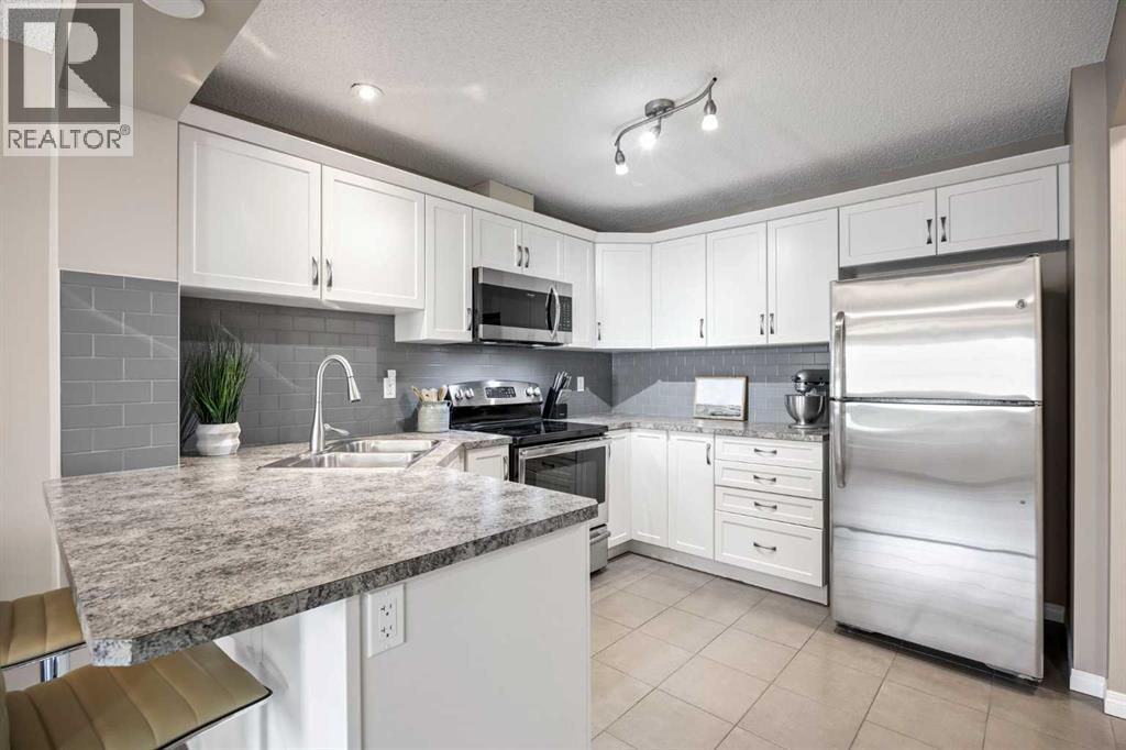 1587 Windstone Road Sw, Airdrie, Alberta  T4B 3X6 - Photo 10 - A2254255