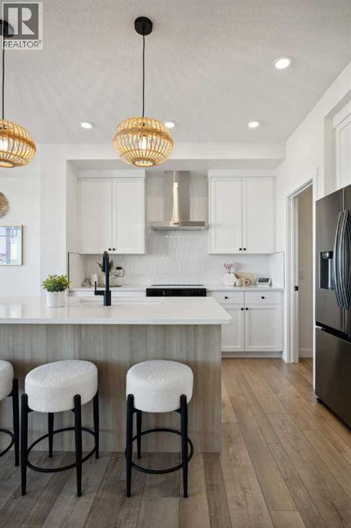 209 Southbow Drive, Cochrane, Alberta  T4C 3J3 - Photo 12 - A2265512