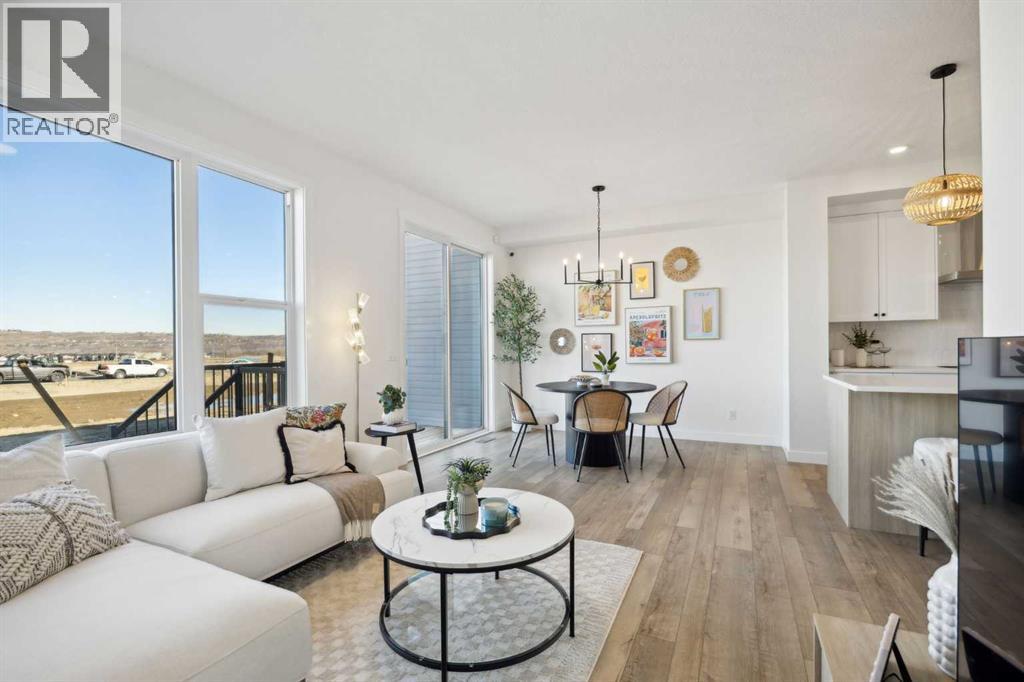 209 Southbow Drive, Cochrane, Alberta  T4C 3J3 - Photo 9 - A2265512