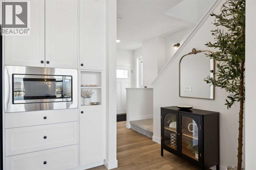 209 Southbow Drive, Cochrane, Alberta  T4C 3J3 - Photo 6 - A2265512