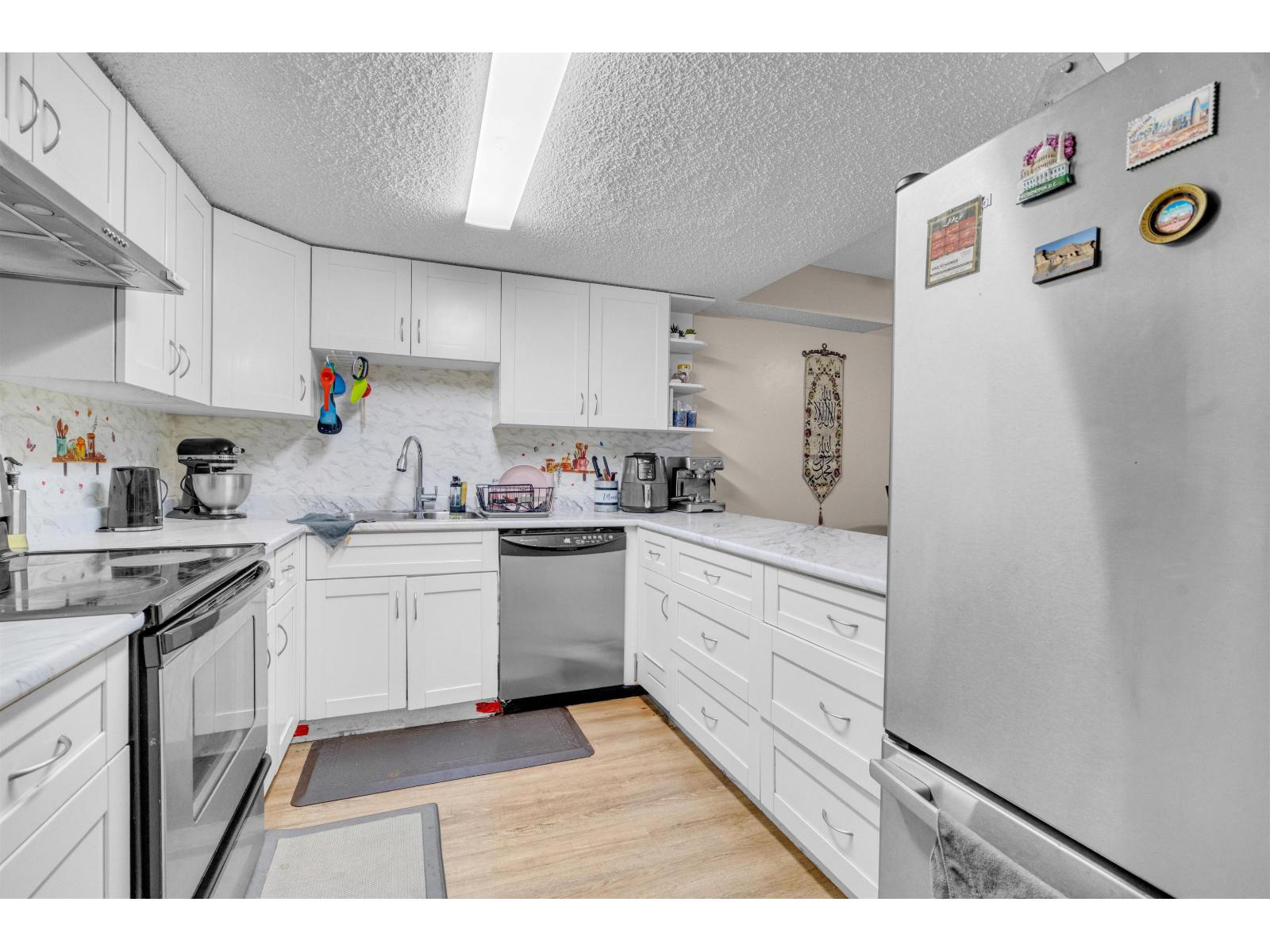 102 7150 133 Street, Surrey, British Columbia V3W 7Z7 - Photo 14 - R3058040