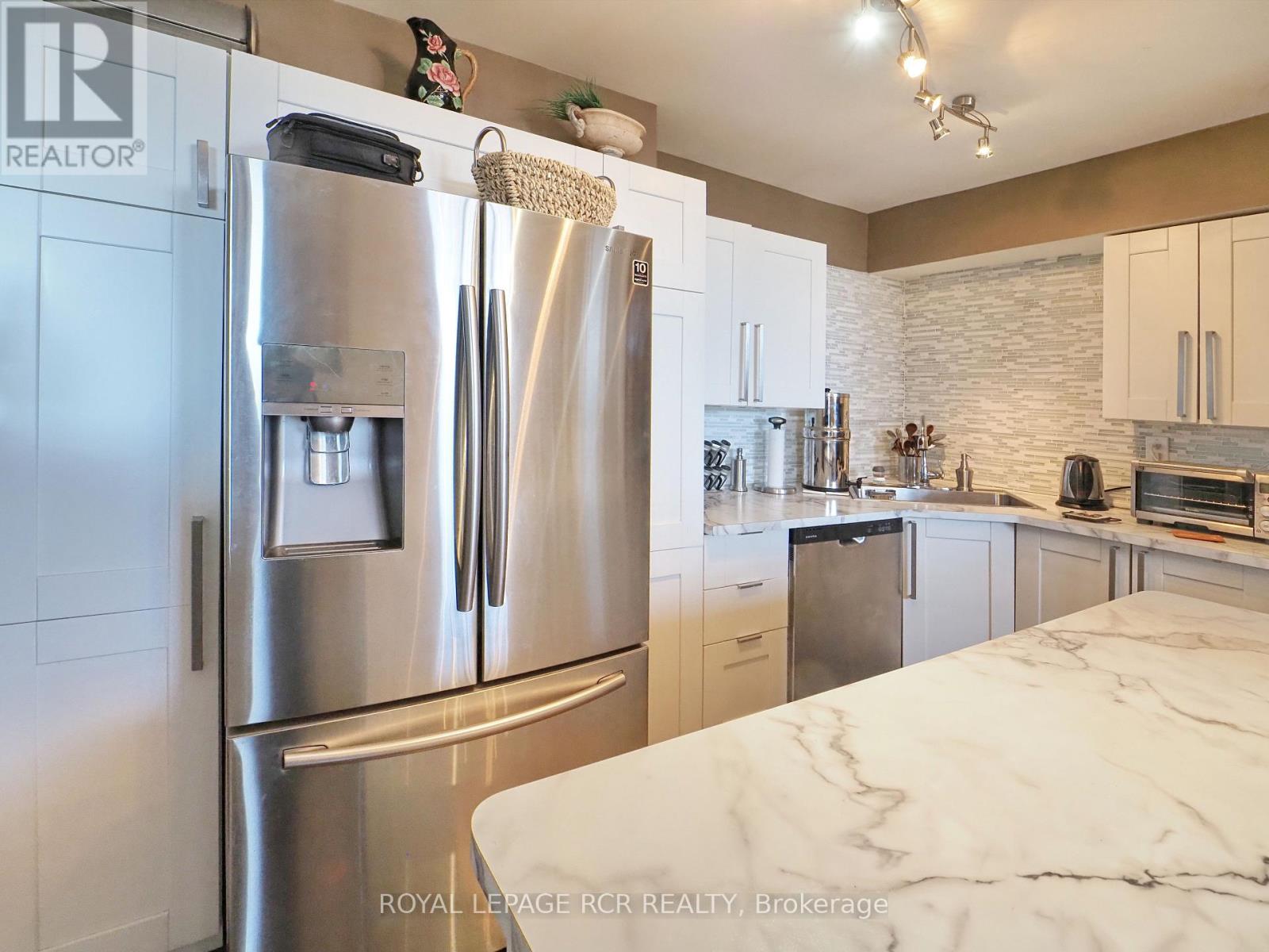 1003 - 3533 Derry Road E, Mississauga, Ontario  L4T 1B1 - Photo 3 - W12487079