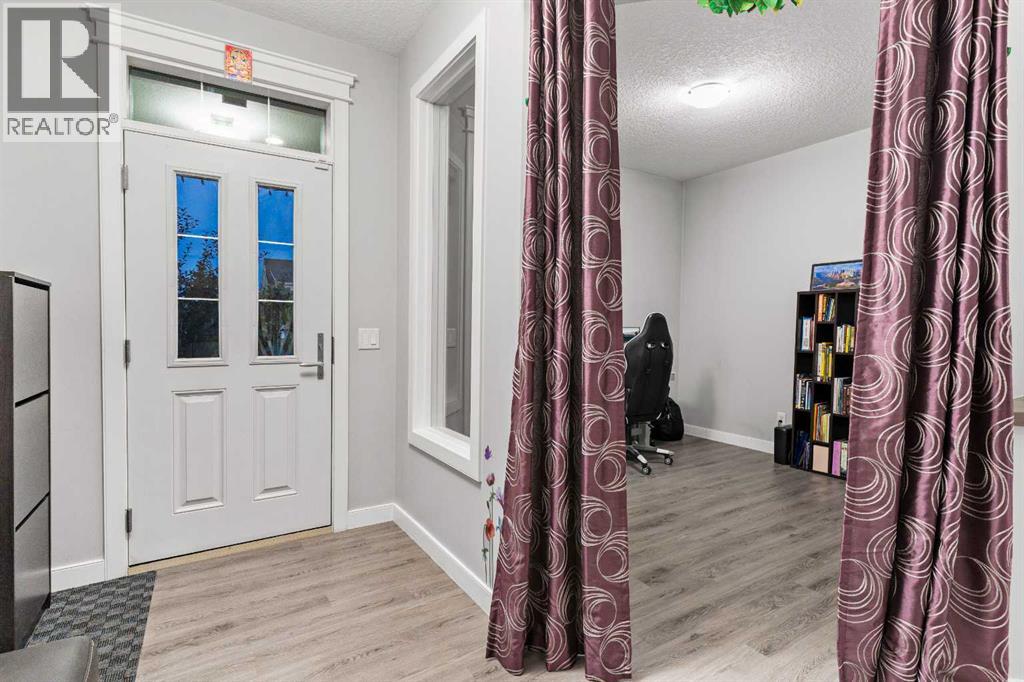 562 Silverado Boulevard Sw, Calgary, Alberta  T2X 3Z2 - Photo 4 - A2253647