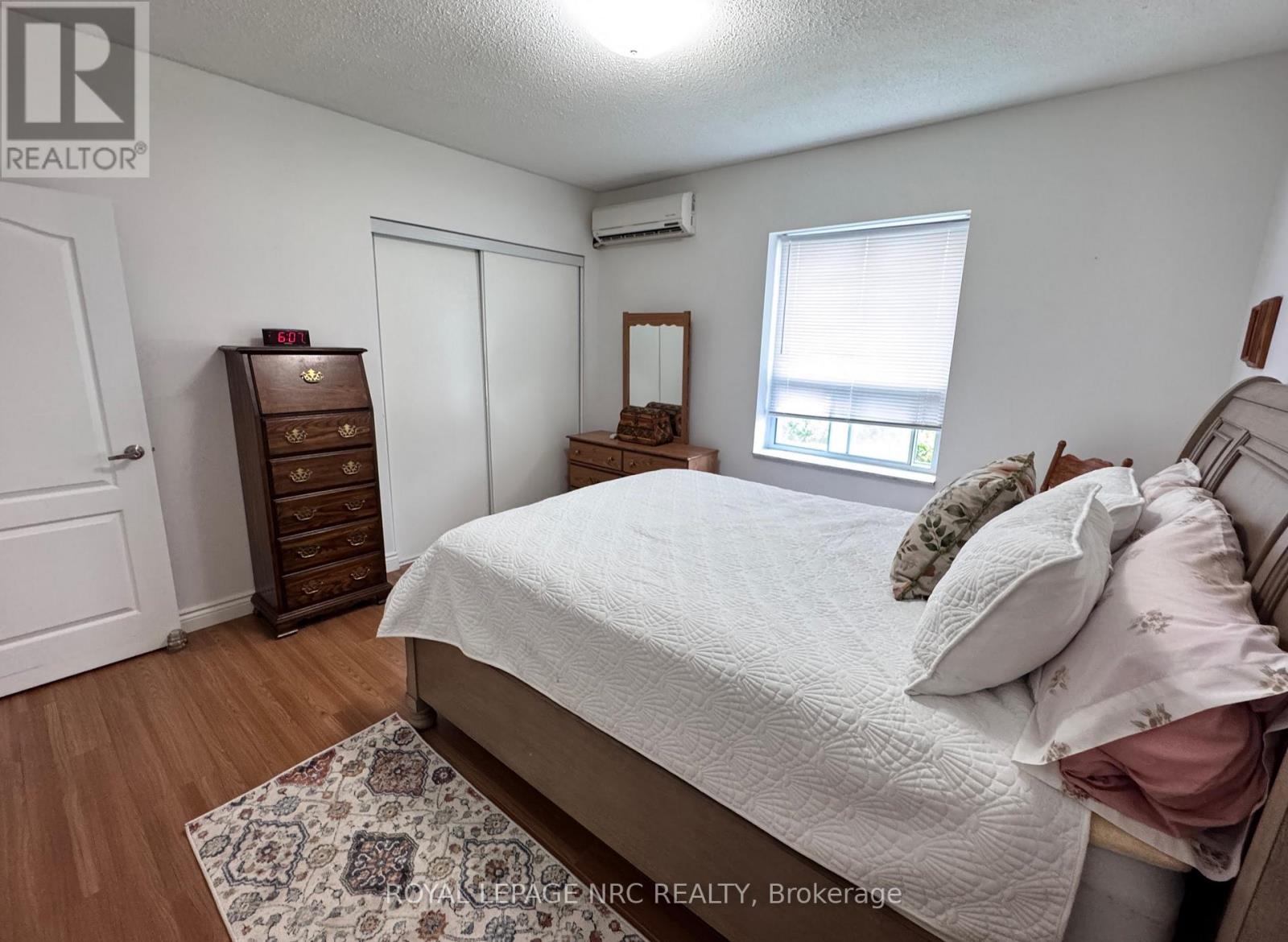 101 - 6390 Huggins Street, Niagara Falls (Stamford), Ontario  L2J 1H1 - Photo 11 - X12487354