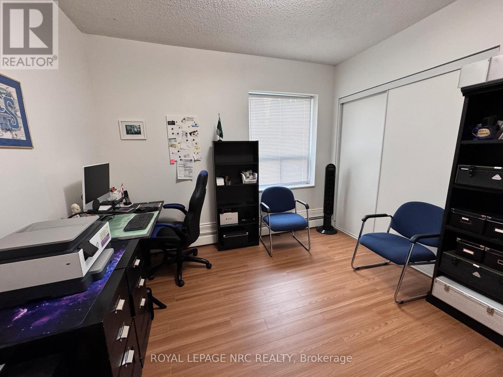 101 - 6390 Huggins Street, Niagara Falls (Stamford), Ontario  L2J 1H1 - Photo 12 - X12487354