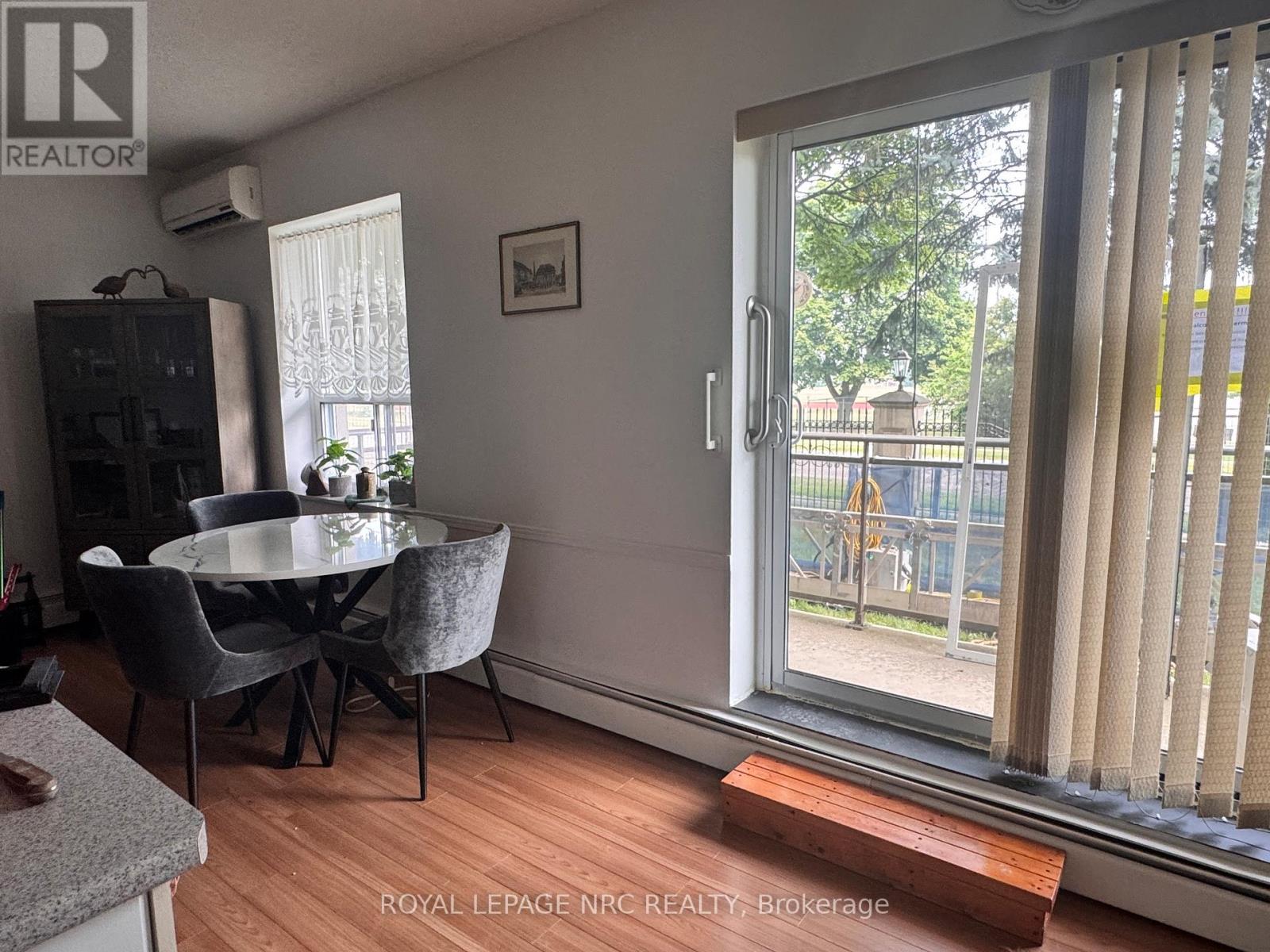 101 - 6390 Huggins Street, Niagara Falls (Stamford), Ontario  L2J 1H1 - Photo 4 - X12487354