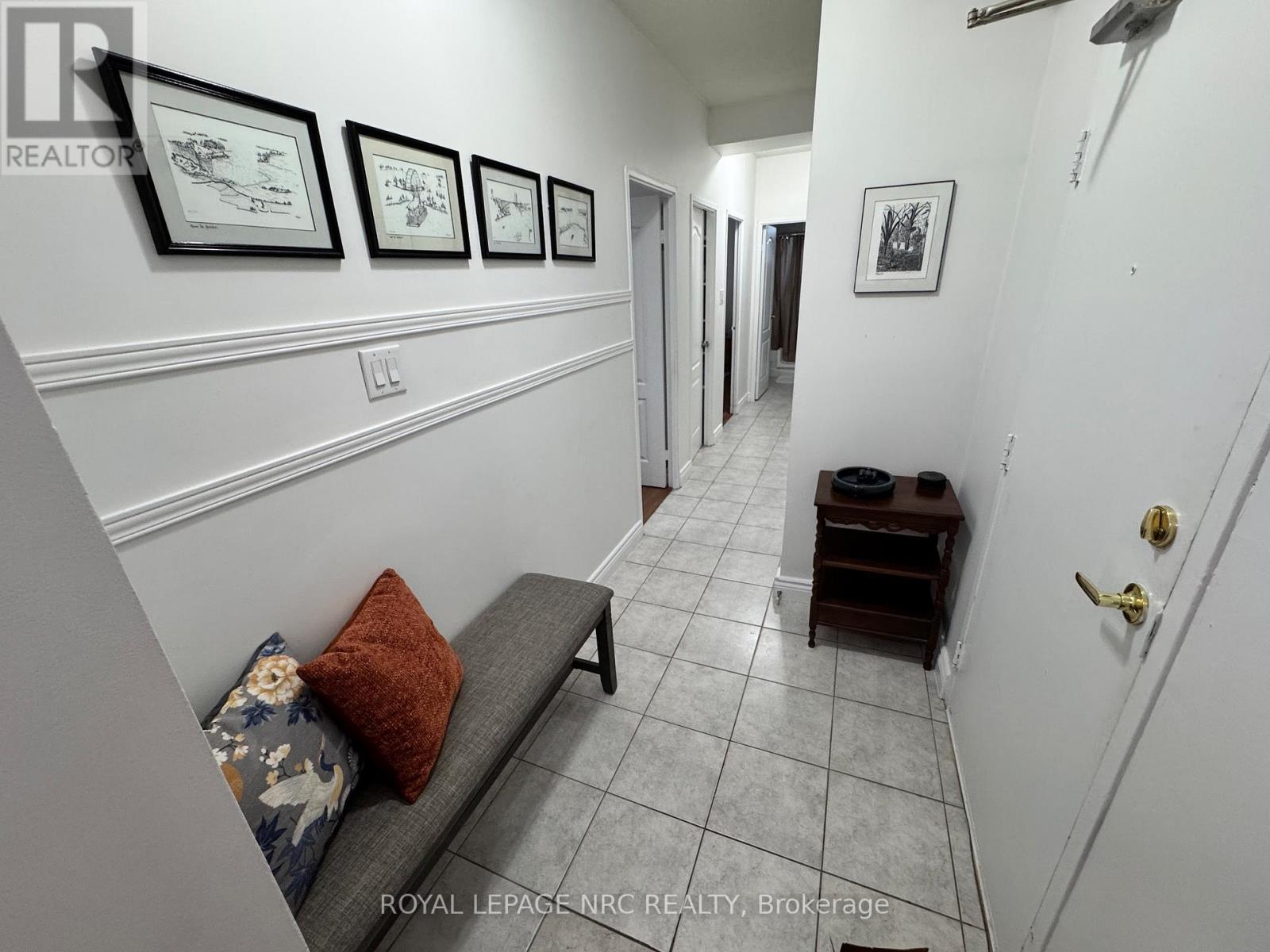 101 - 6390 Huggins Street, Niagara Falls (Stamford), Ontario  L2J 1H1 - Photo 7 - X12487354