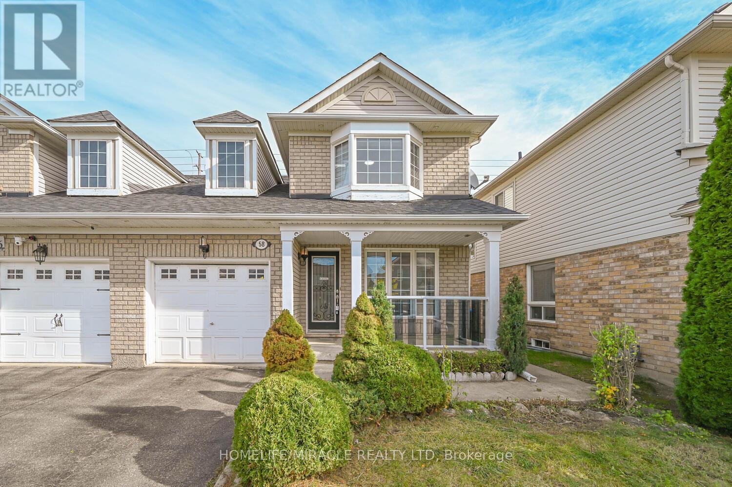 58 Sweetwood Circle, Brampton, Ontario  L7A 2X7 - Photo 3 - W12487319