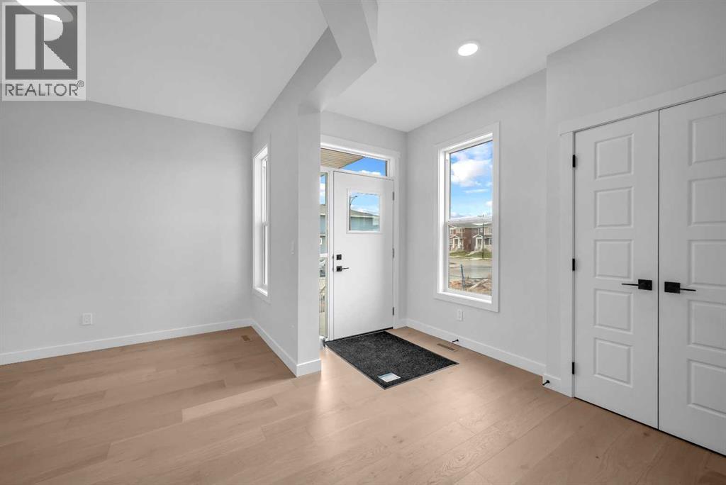 211 Chelsea Park, Chestermere, Alberta  T1X 2T3 - Photo 4 - A2227173