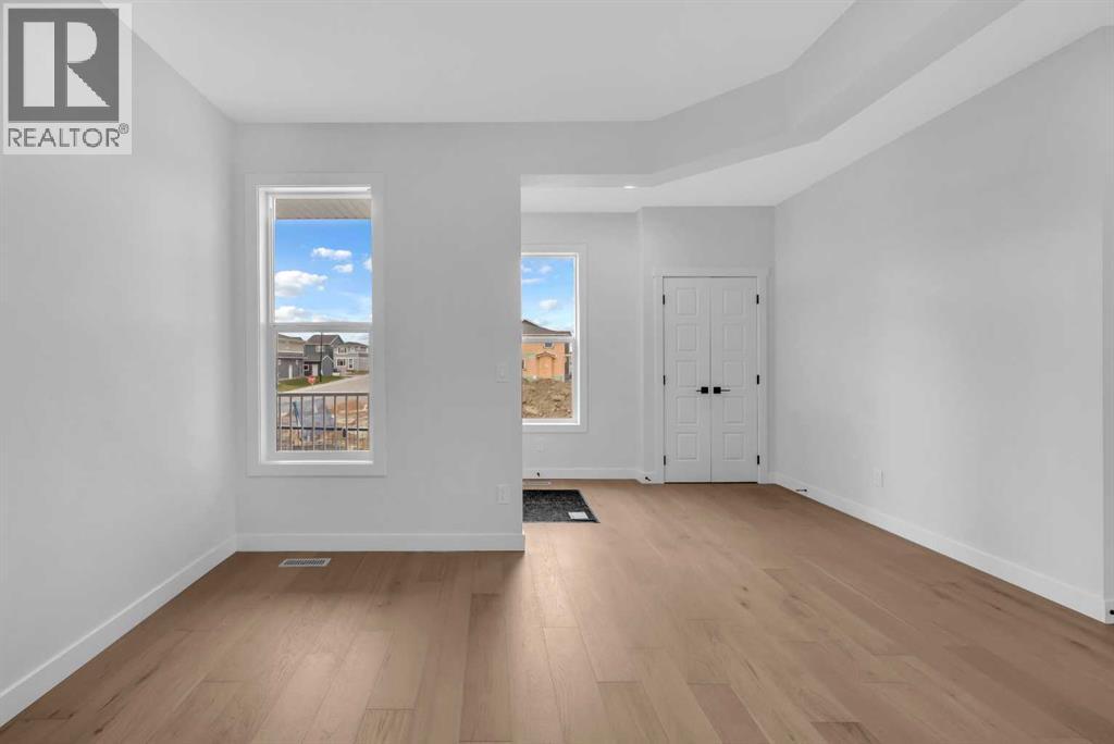 211 Chelsea Park, Chestermere, Alberta  T1X 2T3 - Photo 5 - A2227173