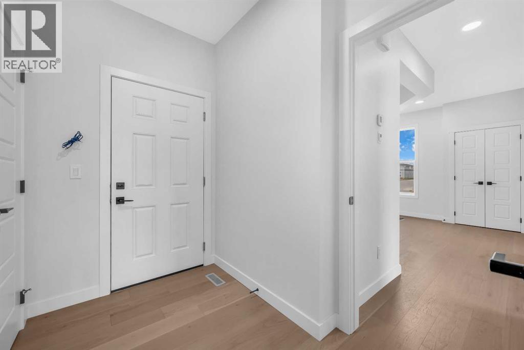 211 Chelsea Park, Chestermere, Alberta  T1X 2T3 - Photo 6 - A2227173