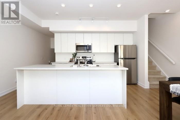 347 - 3066 Sixth Line, Oakville, Ontario  L6M 1P8 - Photo 3 - W12487108