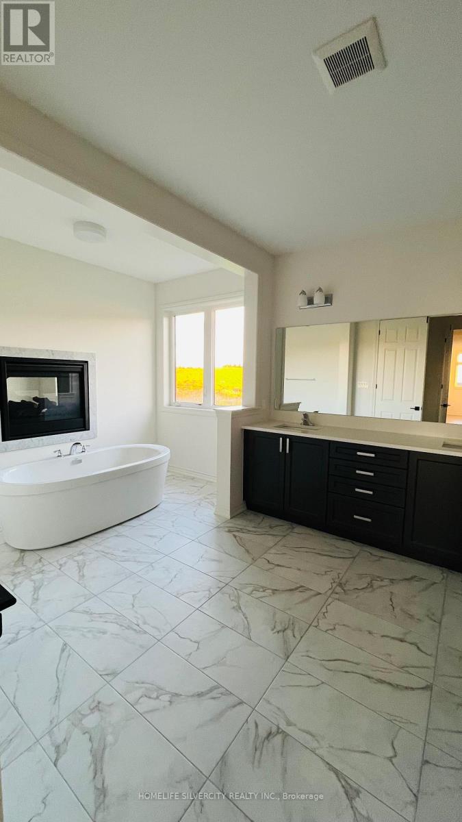 23 Marigold Boulevard E, Adjala-Tosorontio, Ontario  L0G 1W0 - Photo 5 - N12487397