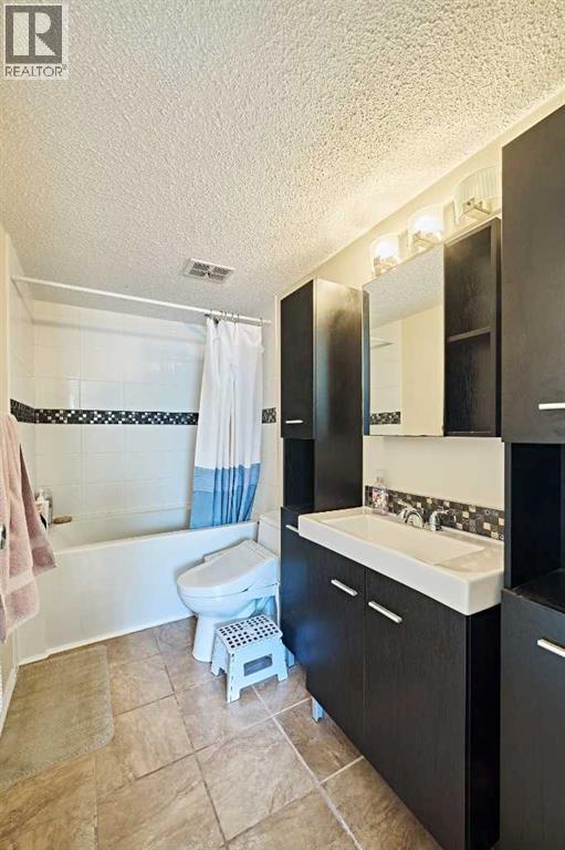 8414 Berwick Road Nw, Calgary, Alberta  T3K 1E5 - Photo 20 - A2259911