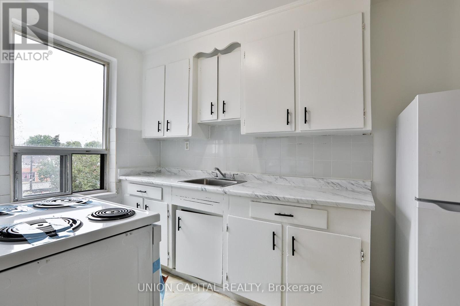 310 - 1969 Eglinton Avenue W, Toronto, Ontario  M6E 2K1 - Photo 7 - W12487486