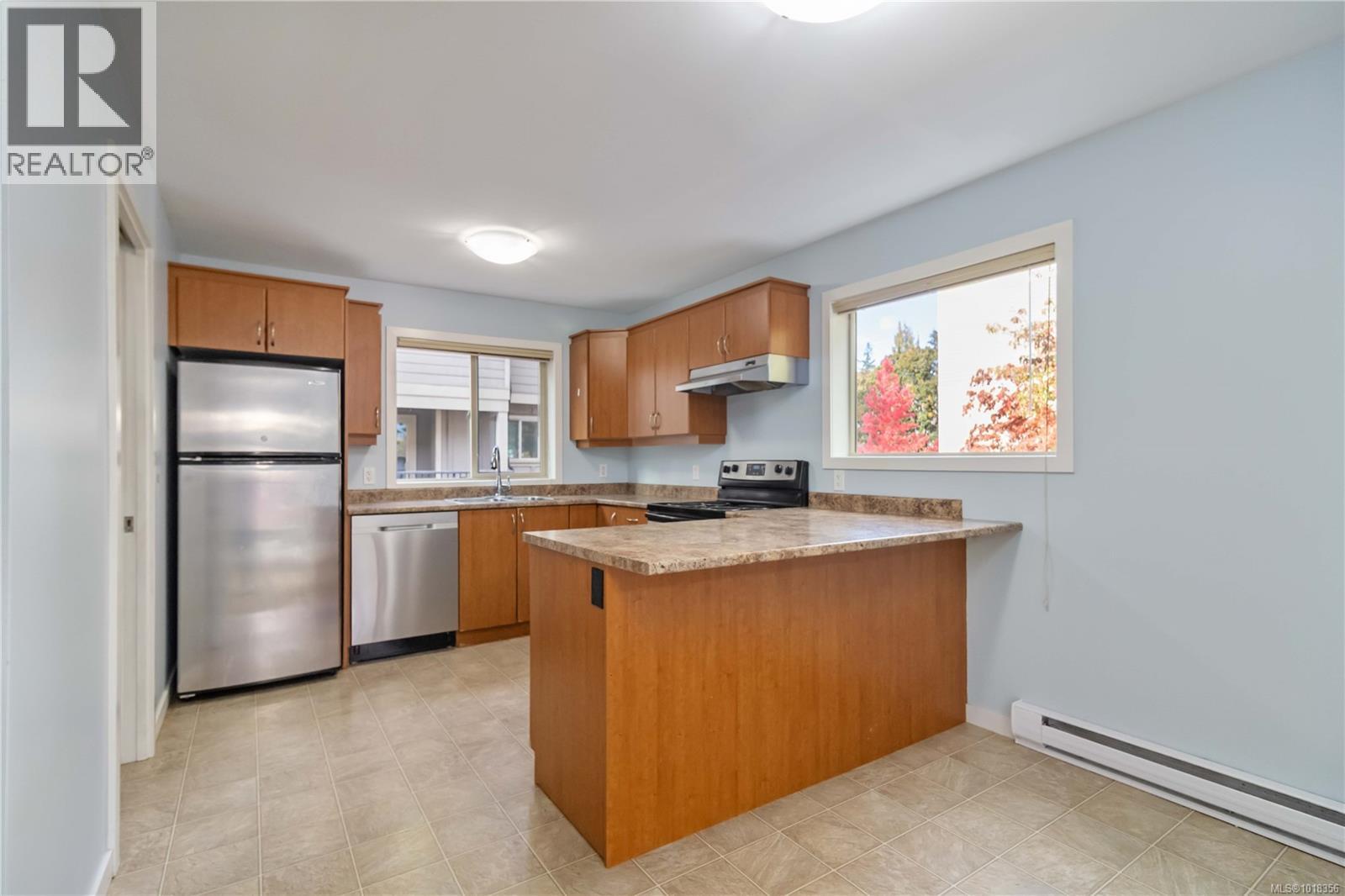 101 2710 Peatt Rd, Langford, British Columbia  V9B 3V3 - Photo 8 - 1018356