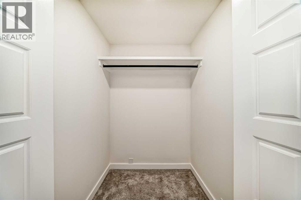 946 Berkley Drive Nw, Calgary, Alberta  T3K 1A2 - Photo 38 - A2264876