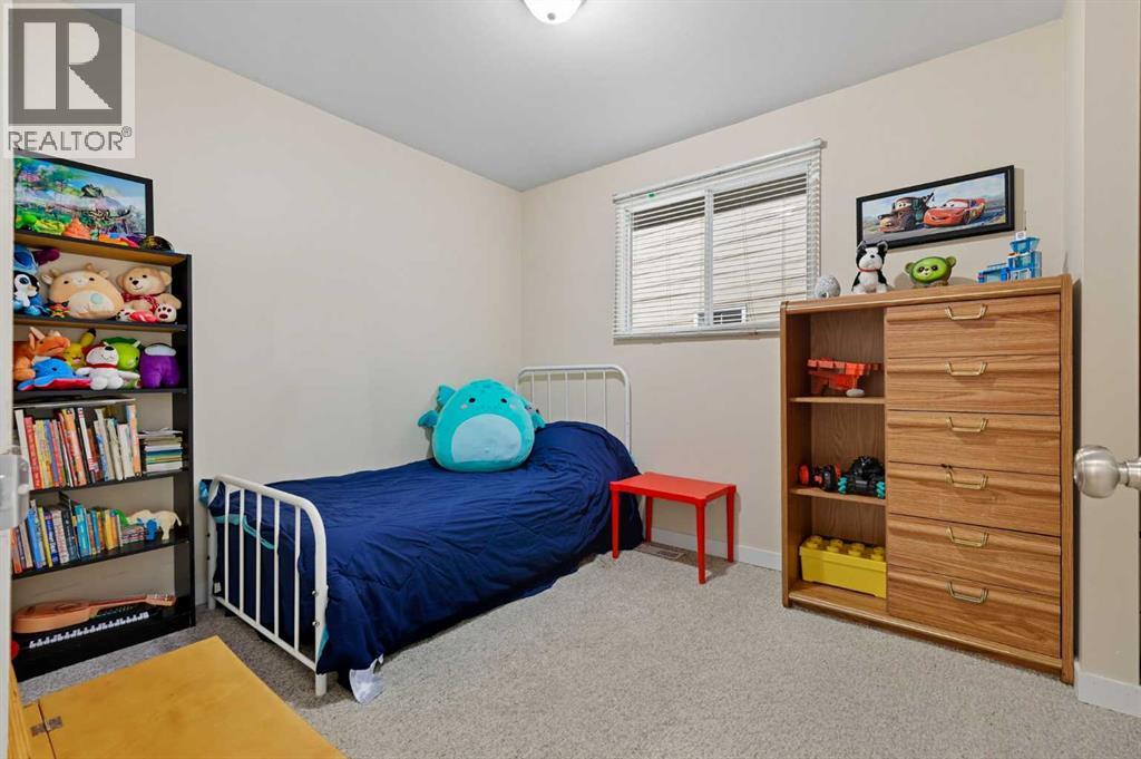 1137 Berkley Drive Nw, Calgary, Alberta  T3K 1S6 - Photo 12 - A2253062