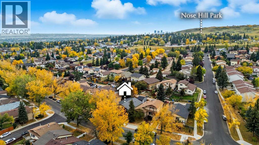 1137 Berkley Drive Nw, Calgary, Alberta  T3K 1S6 - Photo 2 - A2253062