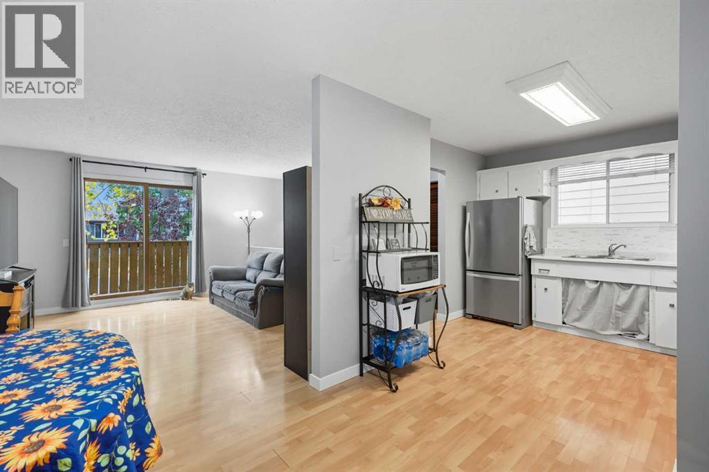 1137 Berkley Drive Nw, Calgary, Alberta  T3K 1S6 - Photo 6 - A2253062