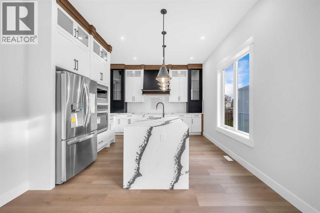 327 Kinniburgh Place, Chestermere, Alberta  T1X 1Y1 - Photo 11 - A2267708