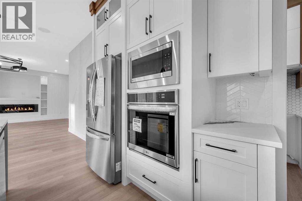 327 Kinniburgh Place, Chestermere, Alberta  T1X 1Y1 - Photo 9 - A2267708