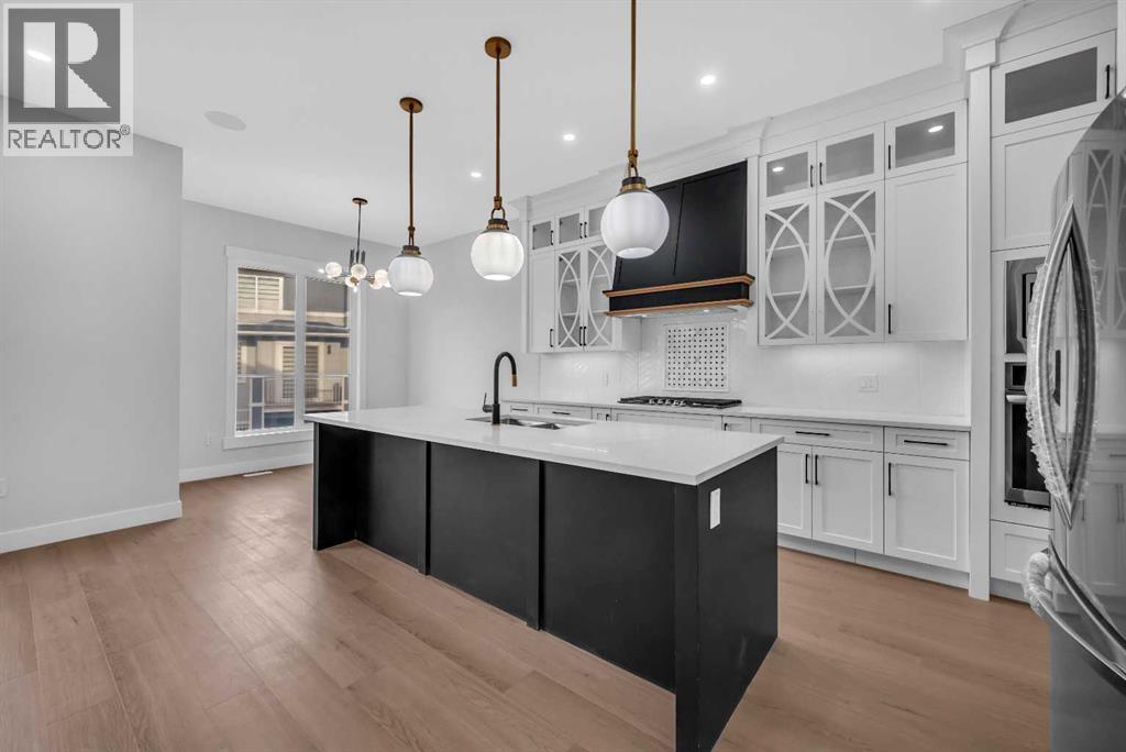 203 Kinniburgh Place, Chestermere, Alberta  T1X 1Y1 - Photo 10 - A2267705