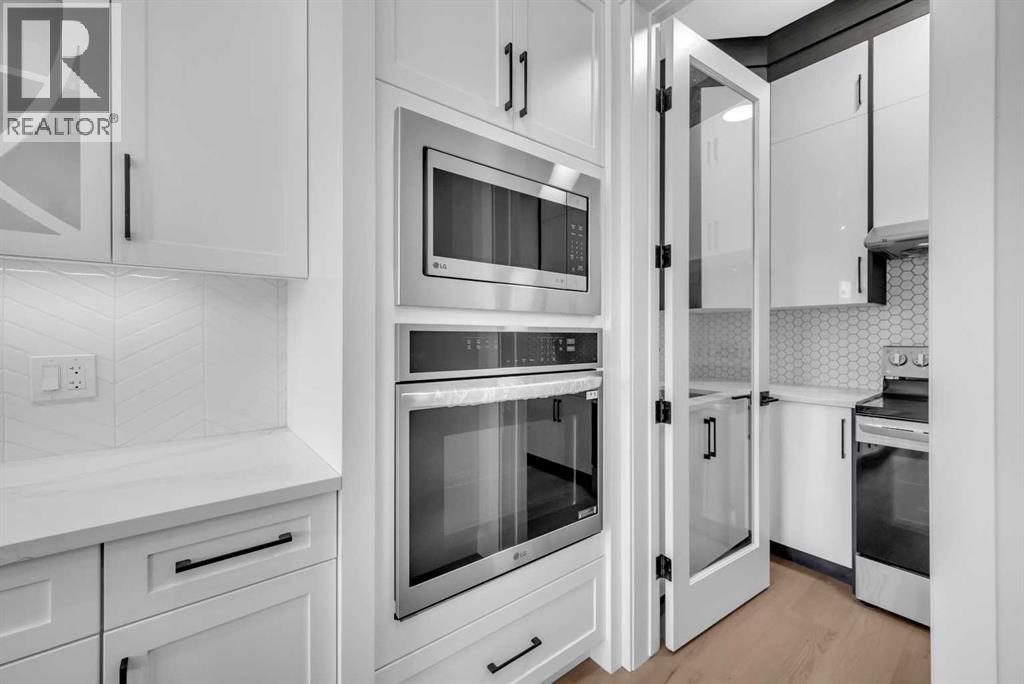 203 Kinniburgh Place, Chestermere, Alberta  T1X 1Y1 - Photo 24 - A2267705