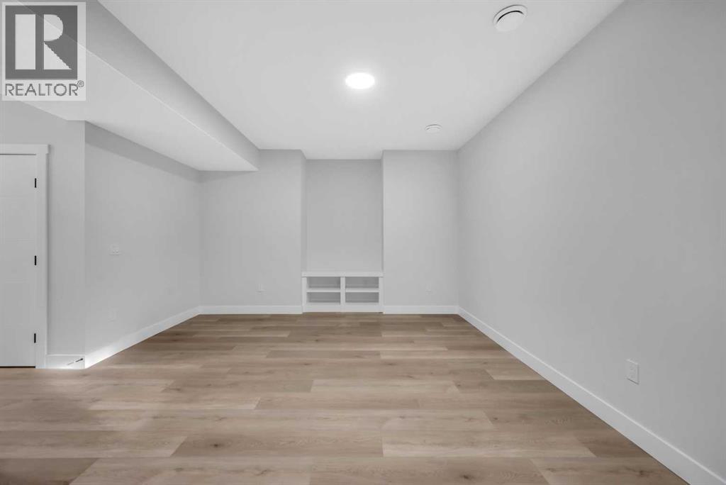 203 Kinniburgh Place, Chestermere, Alberta  T1X 1Y1 - Photo 36 - A2267705