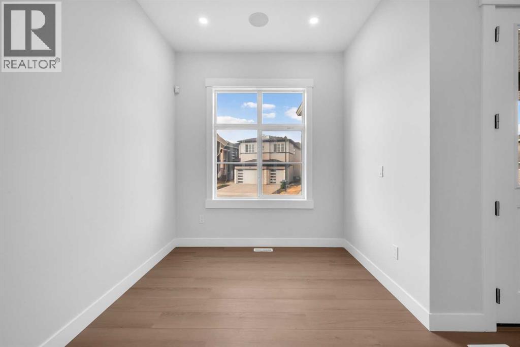 203 Kinniburgh Place, Chestermere, Alberta  T1X 1Y1 - Photo 8 - A2267705