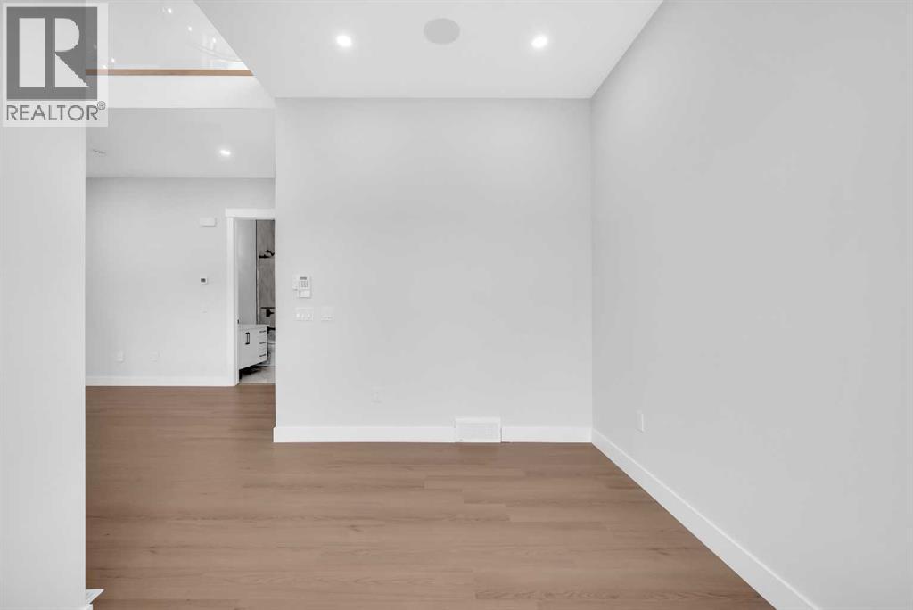 203 Kinniburgh Place, Chestermere, Alberta  T1X 1Y1 - Photo 9 - A2267705