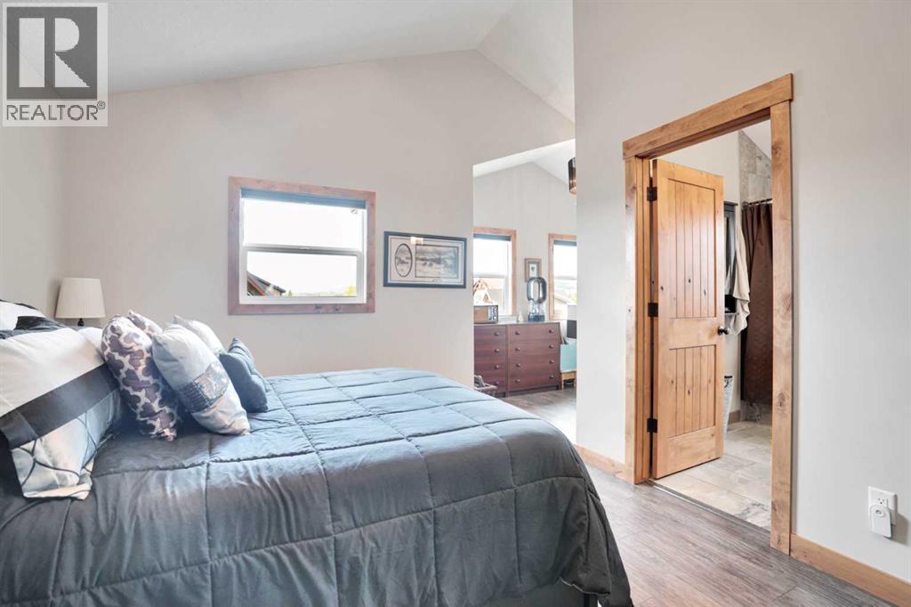 210 Cottageclub Crescent, Rural Rocky View County, Alberta  T4C 1B1 - Photo 17 - A2260091