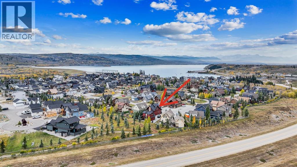 210 Cottageclub Crescent, Rural Rocky View County, Alberta  T4C 1B1 - Photo 31 - A2260091