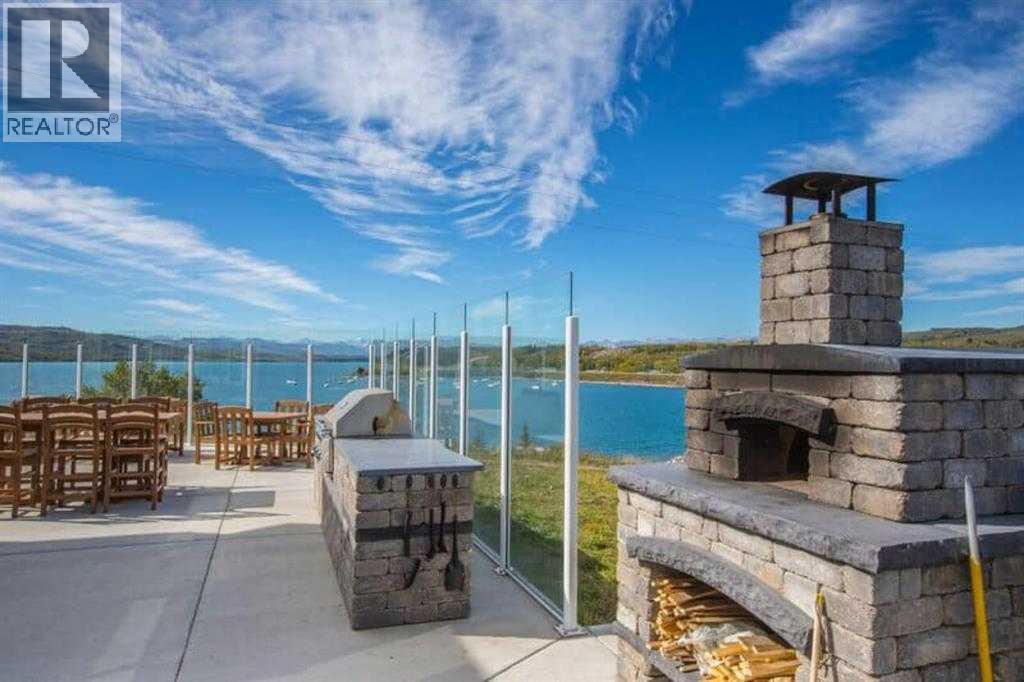 210 Cottageclub Crescent, Rural Rocky View County, Alberta  T4C 1B1 - Photo 43 - A2260091