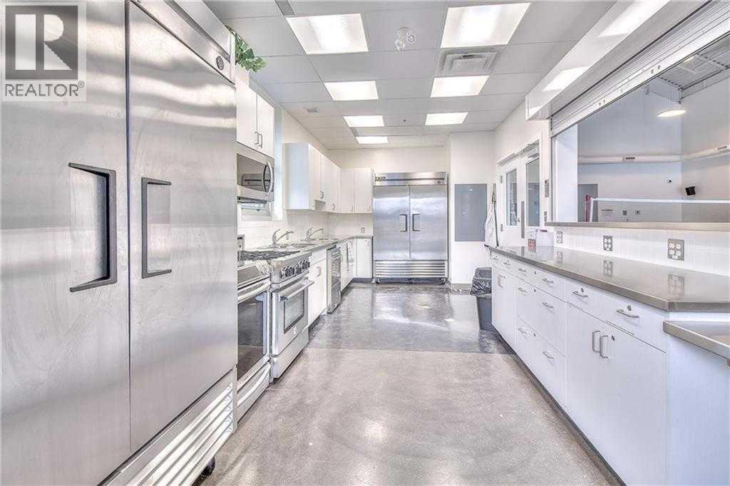 210 Cottageclub Crescent, Rural Rocky View County, Alberta  T4C 1B1 - Photo 40 - A2260091