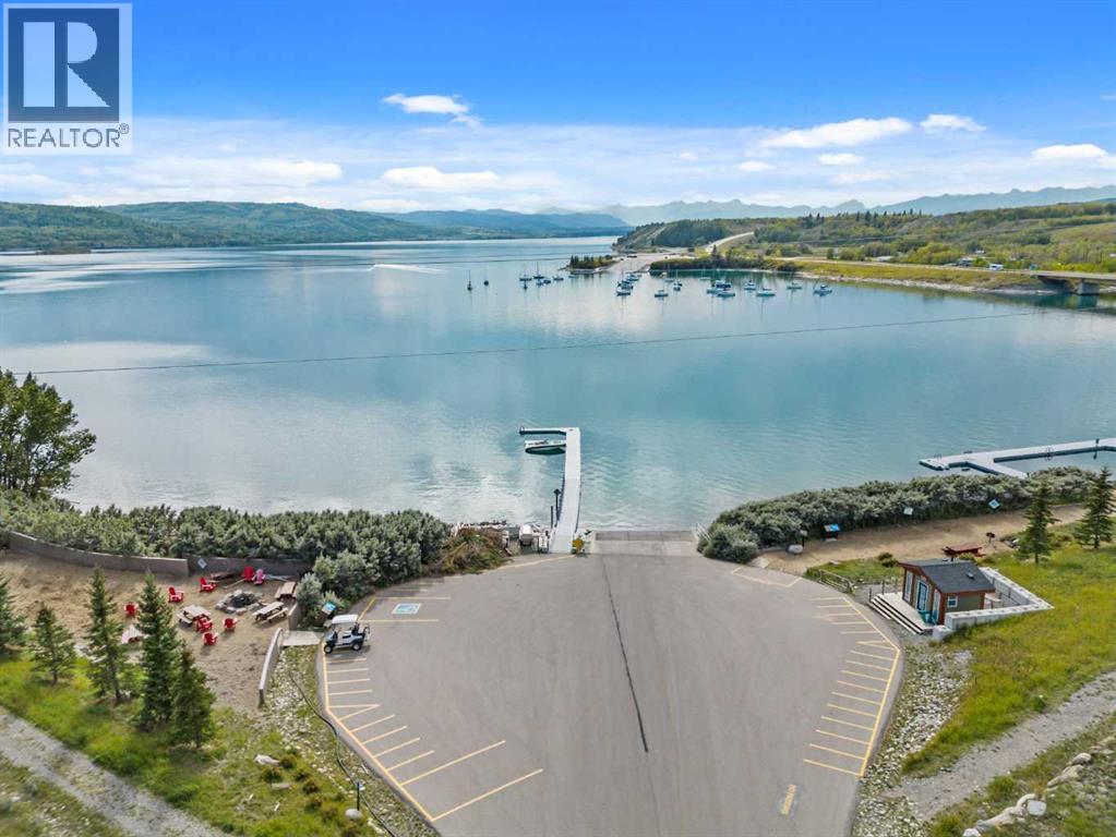 210 Cottageclub Crescent, Rural Rocky View County, Alberta  T4C 1B1 - Photo 35 - A2260091