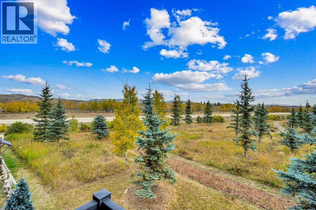 210 Cottageclub Crescent, Rural Rocky View County, Alberta  T4C 1B1 - Photo 27 - A2260091