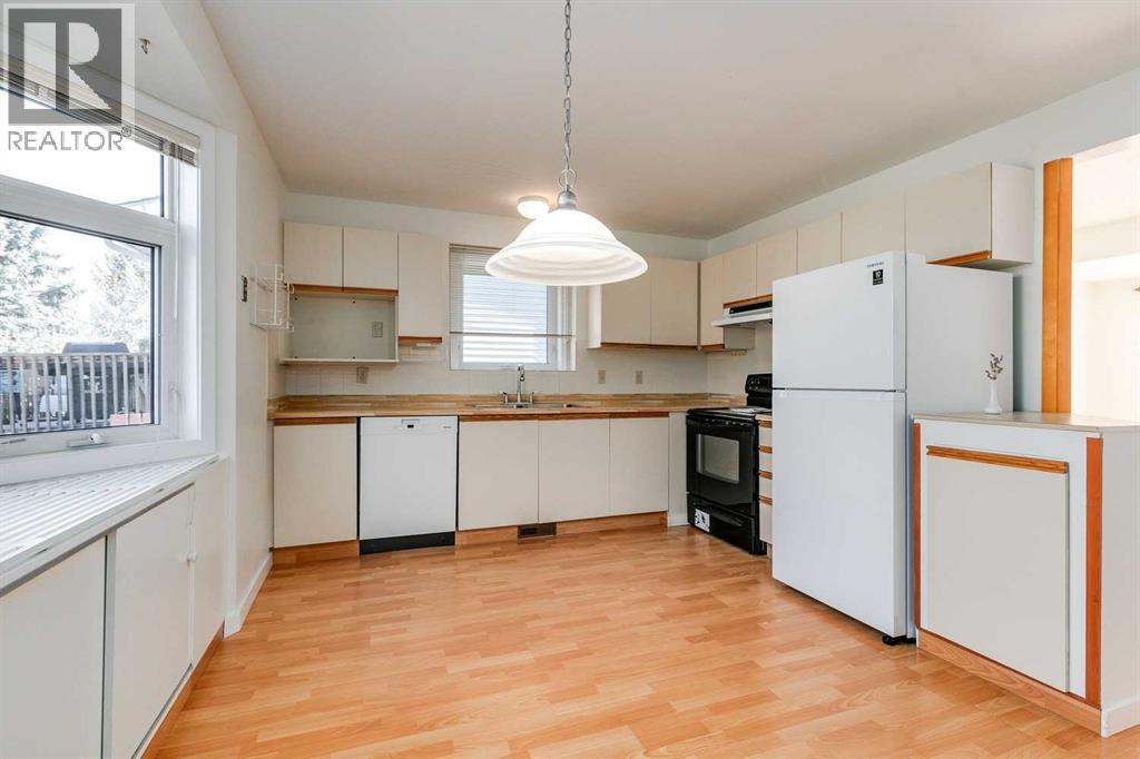 76 Woodstock Road Sw, Calgary, Alberta  T2W 5W2 - Photo 8 - A2265651