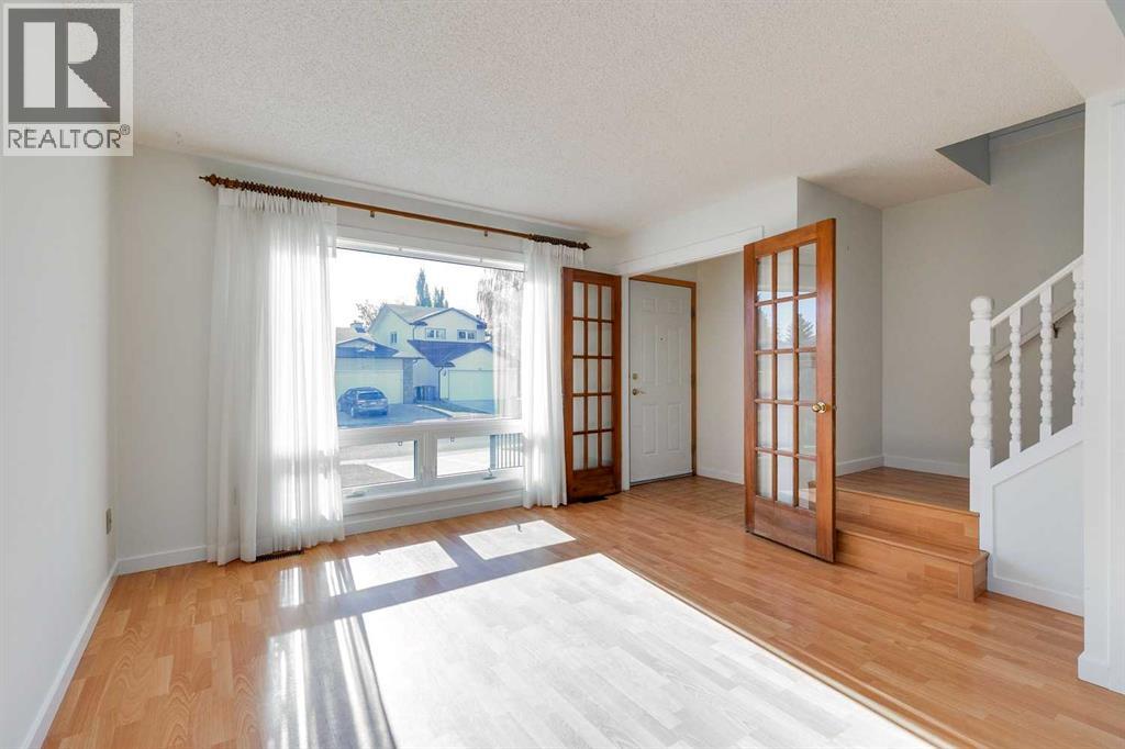 76 Woodstock Road Sw, Calgary, Alberta  T2W 5W2 - Photo 4 - A2265651