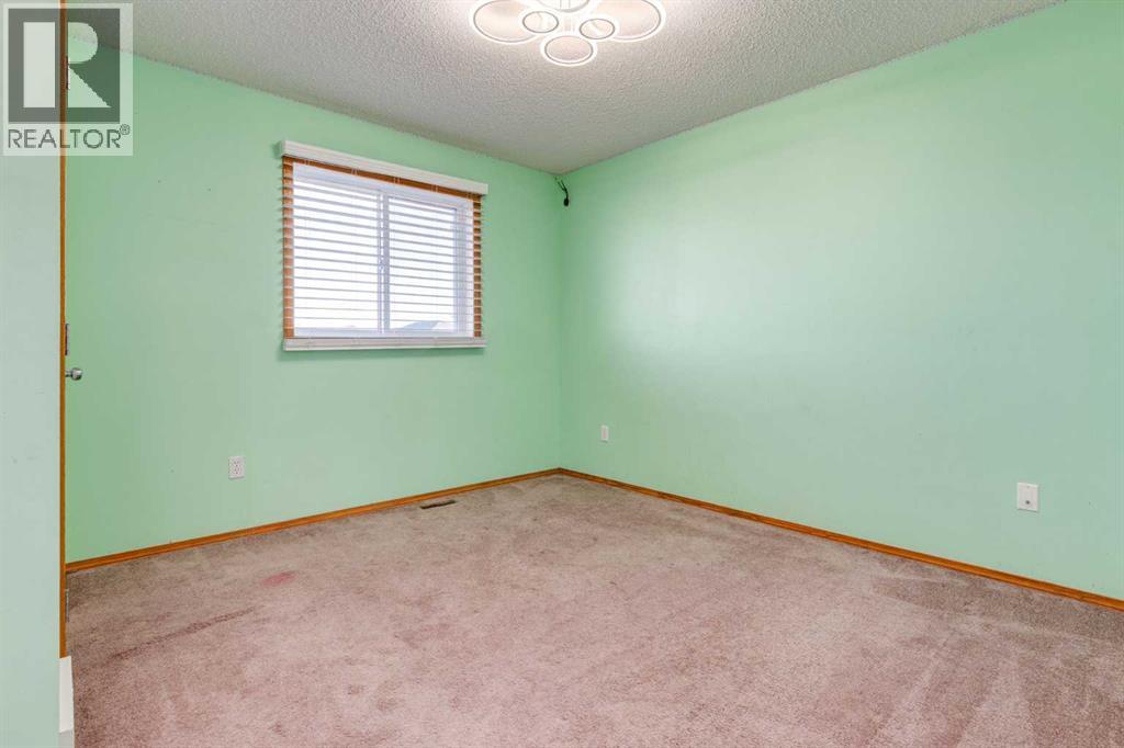 756 Luxstone Landing Sw, Airdrie, Alberta  T4B 3L1 - Photo 11 - A2266789