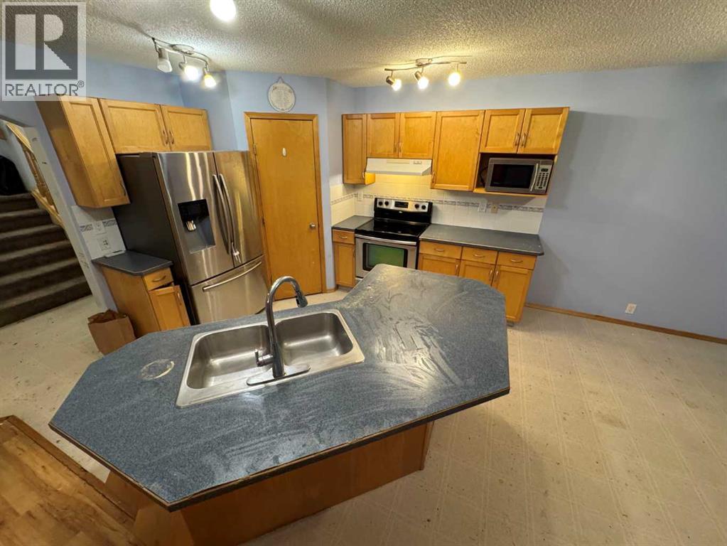 146 Coverton Heights Ne, Calgary, Alberta  T3K 5B2 - Photo 3 - A2267393