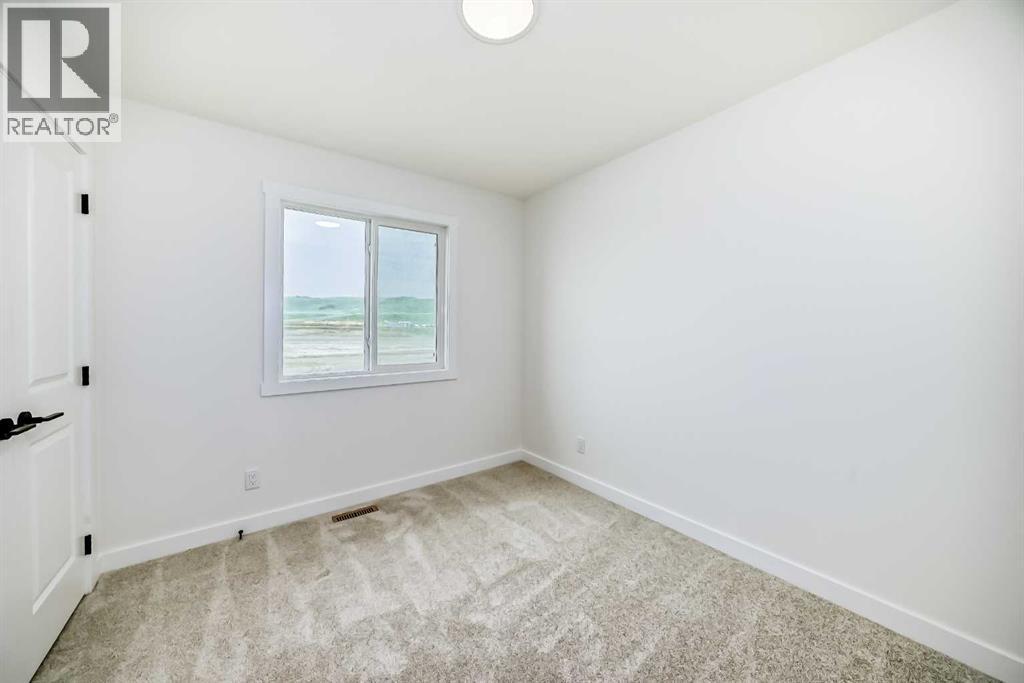 426 Heartland Way, Cochrane, Alberta  T4C 3E5 - Photo 32 - A2235464