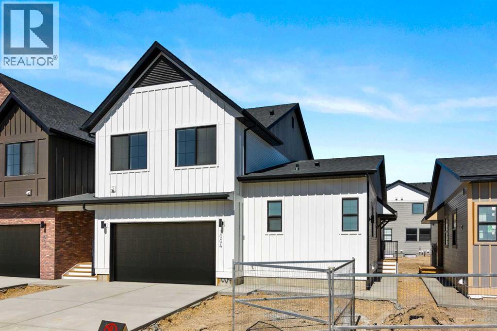 1004, 201 Cooperswood Green Sw, Airdrie, Alberta  T3B 3Y6 - Photo 1 - A2252415