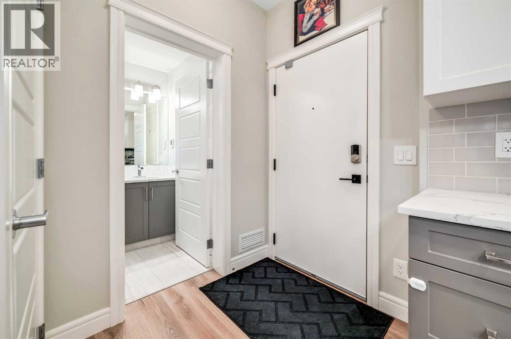 102, 19661 40 Street Se, Calgary, Alberta  T3M 3H3 - Photo 4 - A2263978