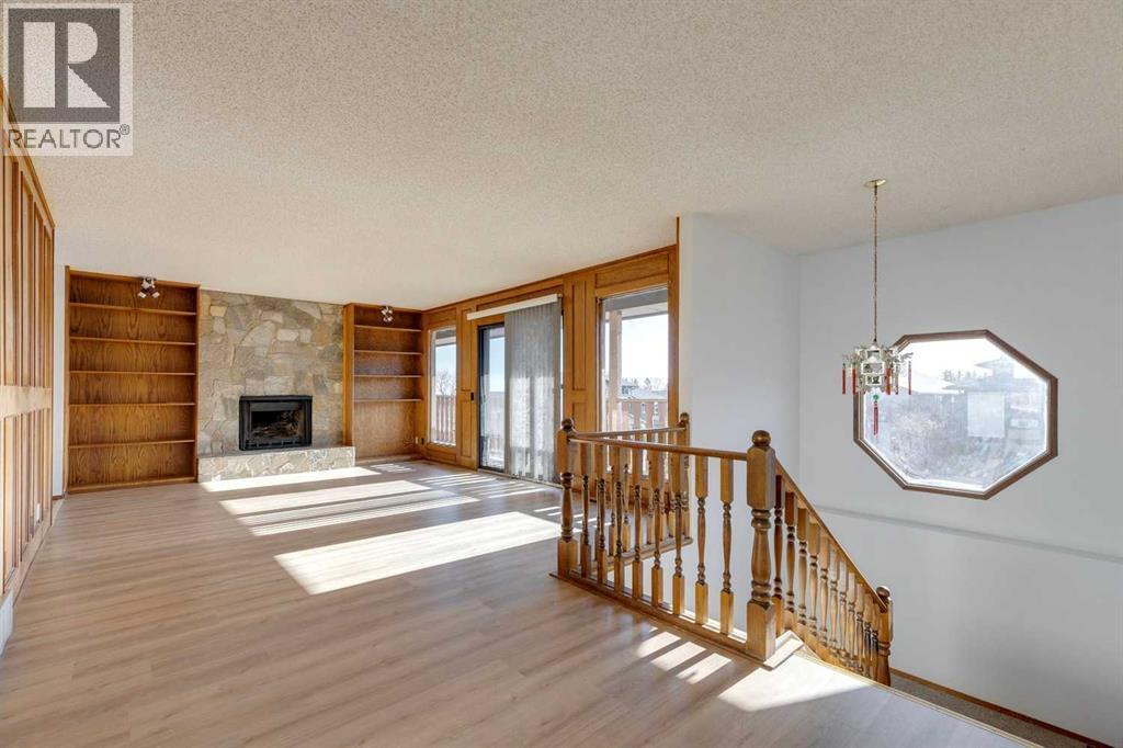 80 Beacham Rise Nw, Calgary, Alberta  T3K 1S2 - Photo 4 - A2266688